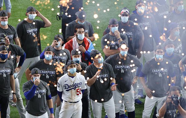 The Los Angeles Dodgers react during the Commissioner's Trophy...