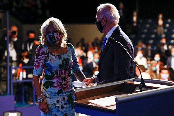 Democratic presidential nominee Joe Biden is joined onstage by wife...