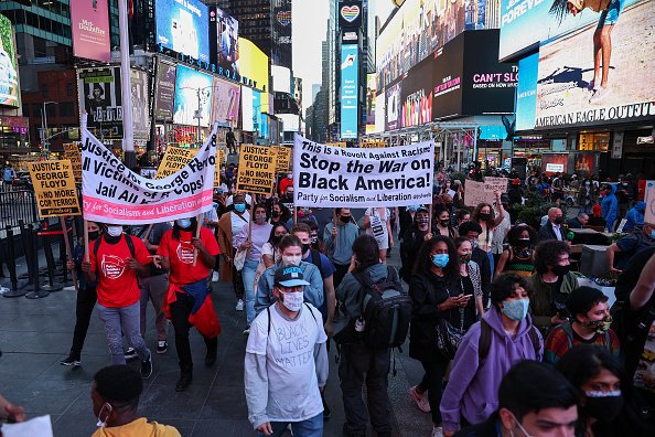 Hundreds march in Times Square