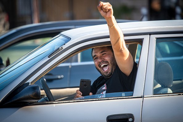 A motorist celebrates in L.A.