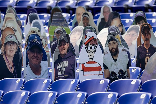 A general view of fan cutouts in seats before the game between the...