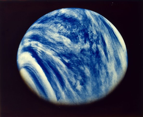 Cloud-covered blue planet