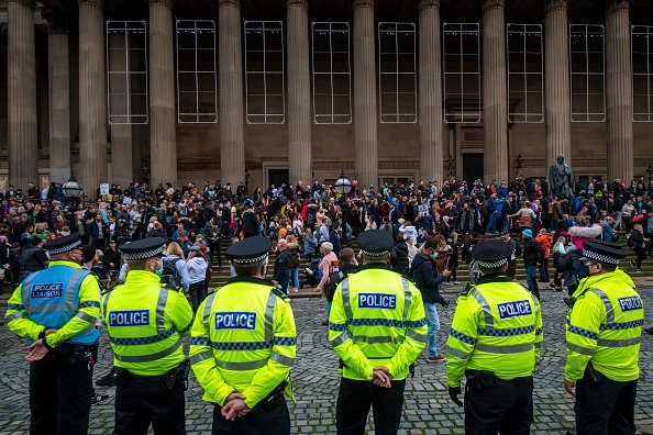 Crowds gather at St George's Hall during an anti lockdown protest on...