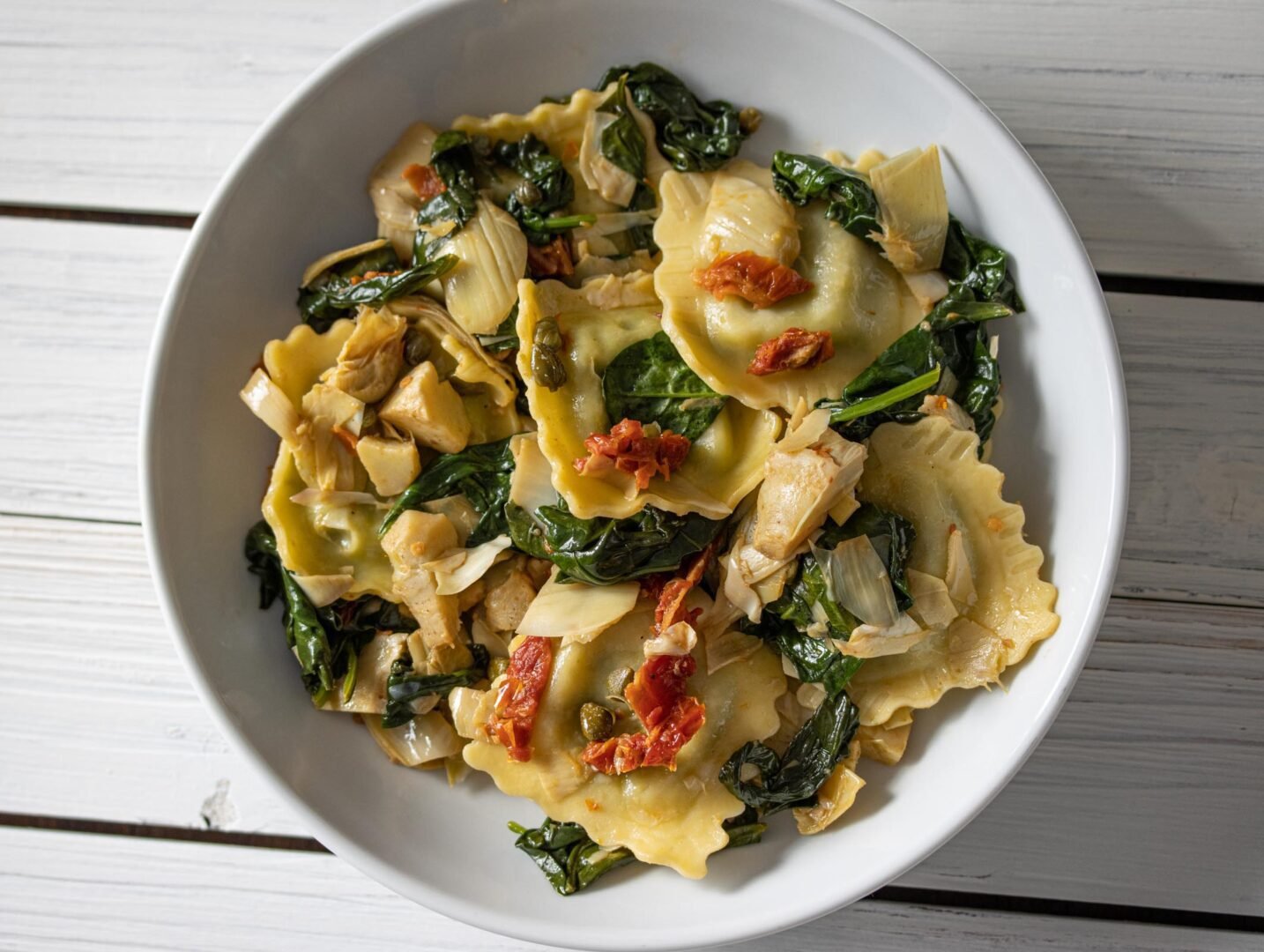 Ravioli with Artichokes Hearts, Capers, Sun-Dried Tomatoes, Spinach