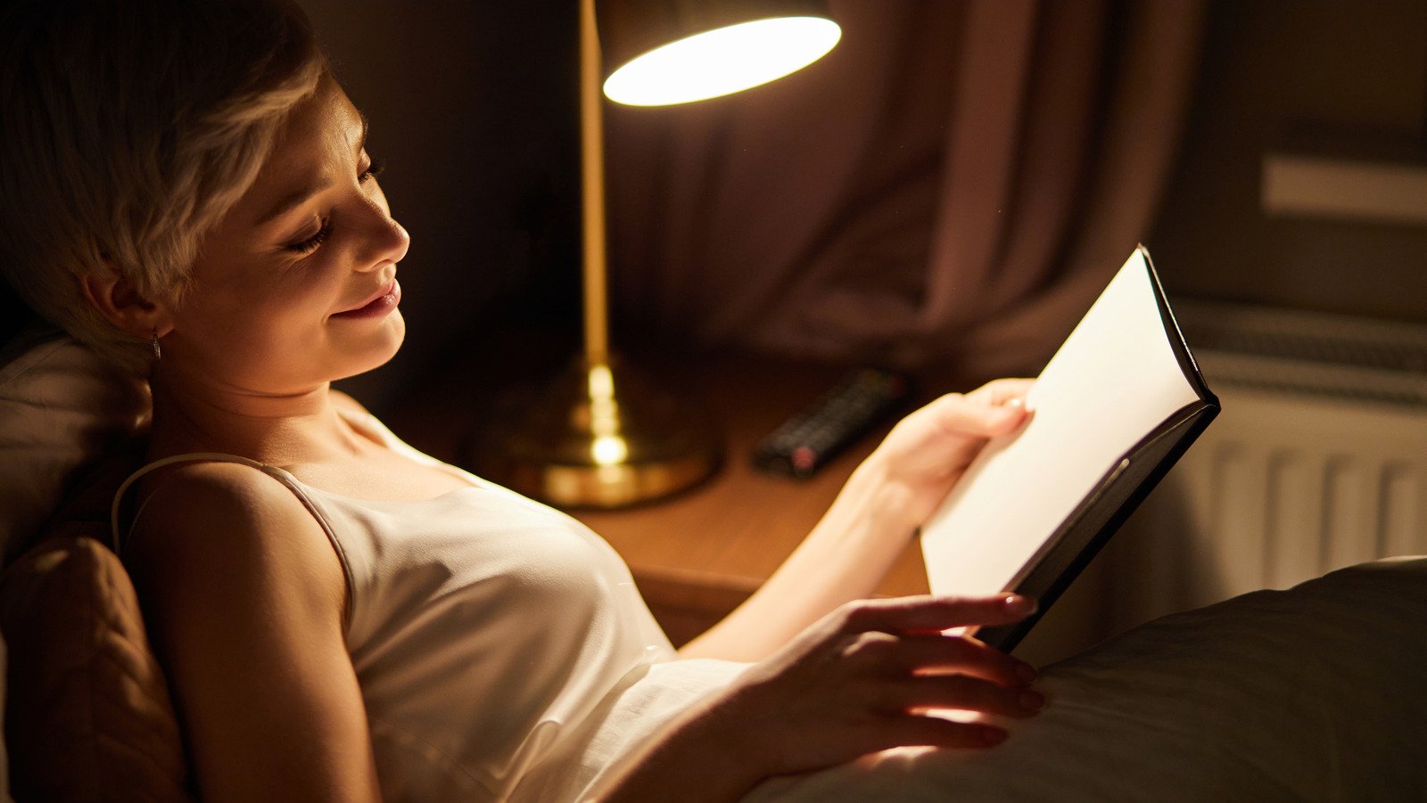 The Reason You Should Avoid Reading In Bed Before Sleeping - cover