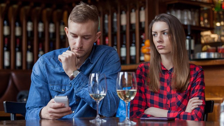 What's A 'Back Burner Relationship'? Here's What To Know