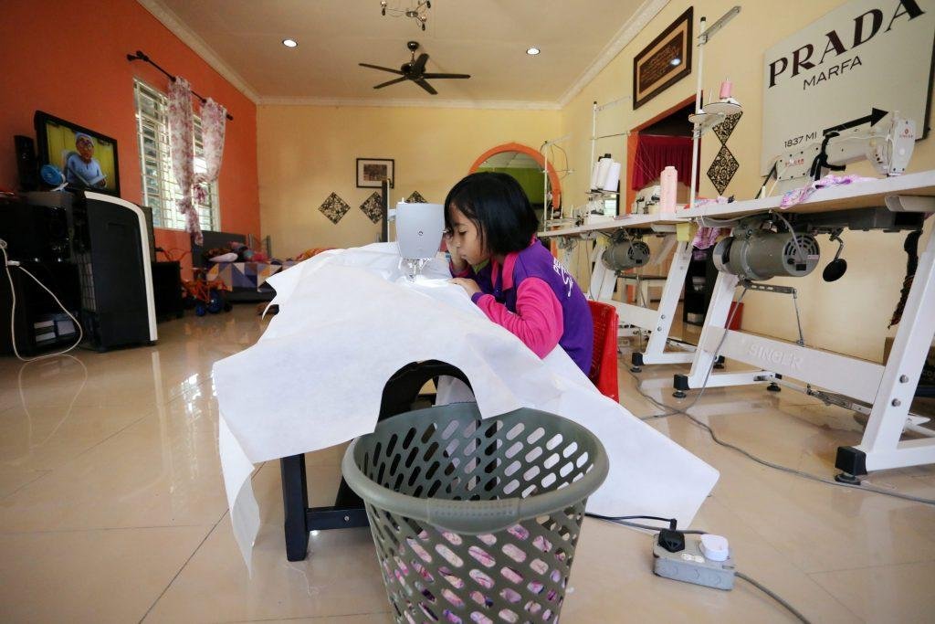 News: For Malaysian schoolgirl, homework is sewing PPE gowns to help beat coronavirus  GLOBAL HEROES MAGAZINE
