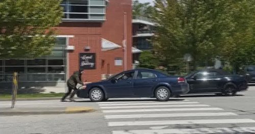 Video shows driver pushing pedestrian down Vancouver street