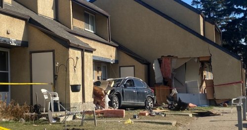 Driver crashes SUV into northeast Edmonton townhouse complex