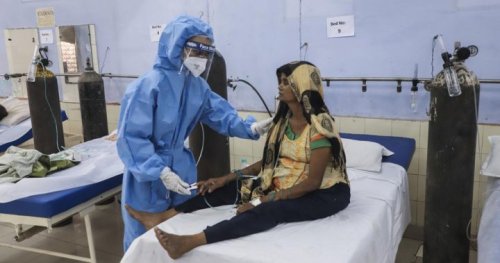 India reports record day of COVID-19 deaths as cases pass 25 million