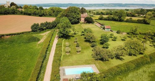 Former rectory for sale boasting heated pool, tennis court and a neighbouring river to cool off in