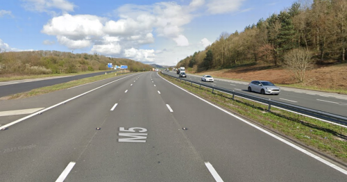 LIVE: M5 lanes reopen after sweets, books and beer kegs spill onto motorway