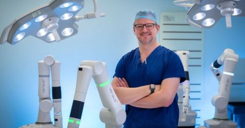 Robot helps removes granddad's tumour in UK-first operation at Gloucestershire Royal Hospital