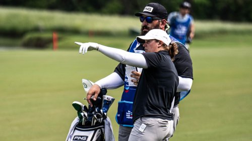 Her husband quit his job to caddie for her. Now she’s leading a major