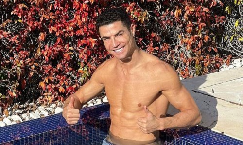 Cristiano Ronaldo Flaunts Ripped Abs as he Poses in Swim Shorts