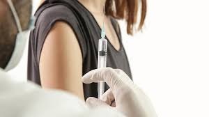 Can pharmacies administer the flu vaccine concurrently with the COVID-19 vaccine?