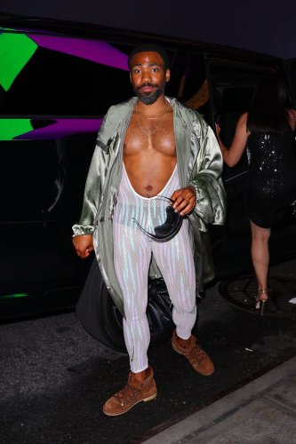 Naturally, Donald Glover Wore Loro Piana Hiking Boots and a Mesh Bodysuit to Beyoncé’s Album Release Party