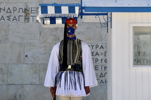 Why Should Greek Evzones Wear Masks While Standing Guard Alone?