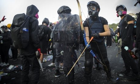 Hong Kong in chaos as protesters gather at universities with bows and arrows