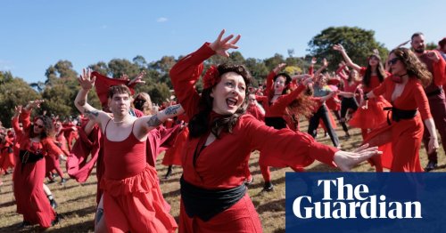 'The Most Wuthering Heights Day Ever': Kate Bush fans gather in red frocks to dance merrily – video