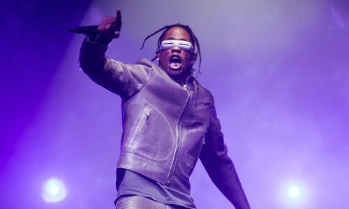 Travis Scott review – fireworks and lasers announce rapper’s post-Astroworld comeback