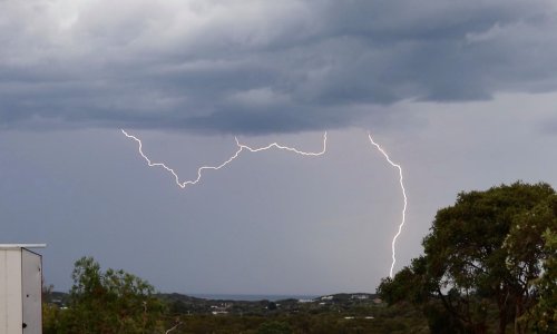 Melbourne hit by more thunderstorms after week of hot weather in Victoria