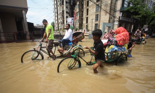 Dozens dead, millions stranded as floods ravage Bangladesh and India