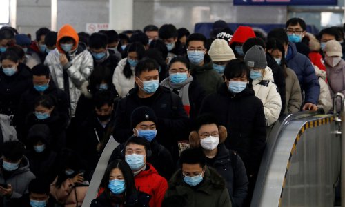 China changes definition of Covid deaths as cases surge