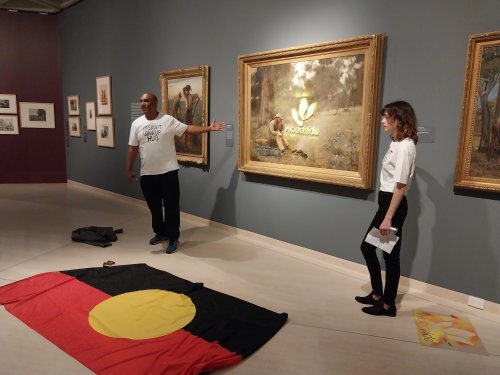 Frederick McCubbin painting defaced with Woodside logo in protest at ...