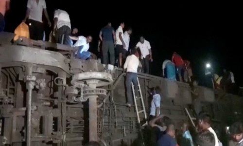 At least 120 people killed and hundreds injured in train crash in eastern India