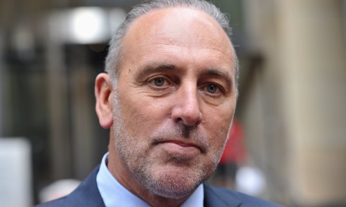 Hillsong pastor Brian Houston charged over allegedly concealing information about child sex offences