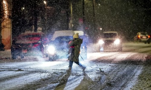 Winter storm brings snow, strong winds and thunderstorms to US north-east