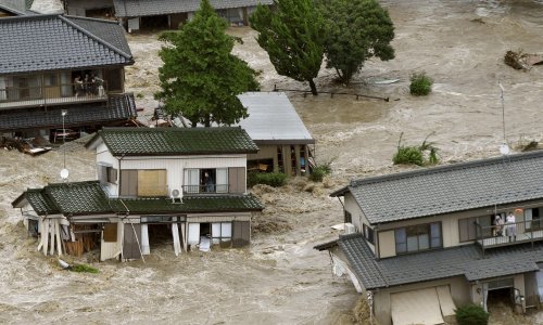 Typhoon Etau: thousands evacuated as severe flooding hits Japan