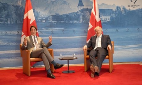 'Very, very modest': Johnson and Trudeau joke about whose private jet is smaller – video