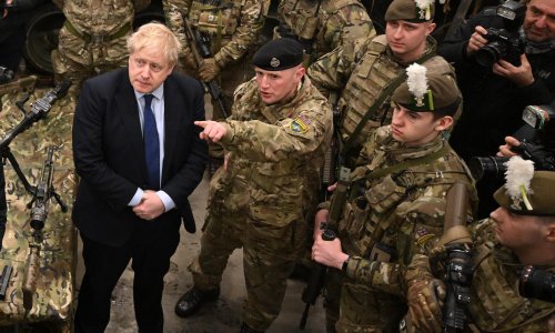 Boris Johnson tries to defuse row after ditching defence spending pledge