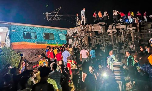 At least 233 people killed and hundreds injured in train crash in eastern India