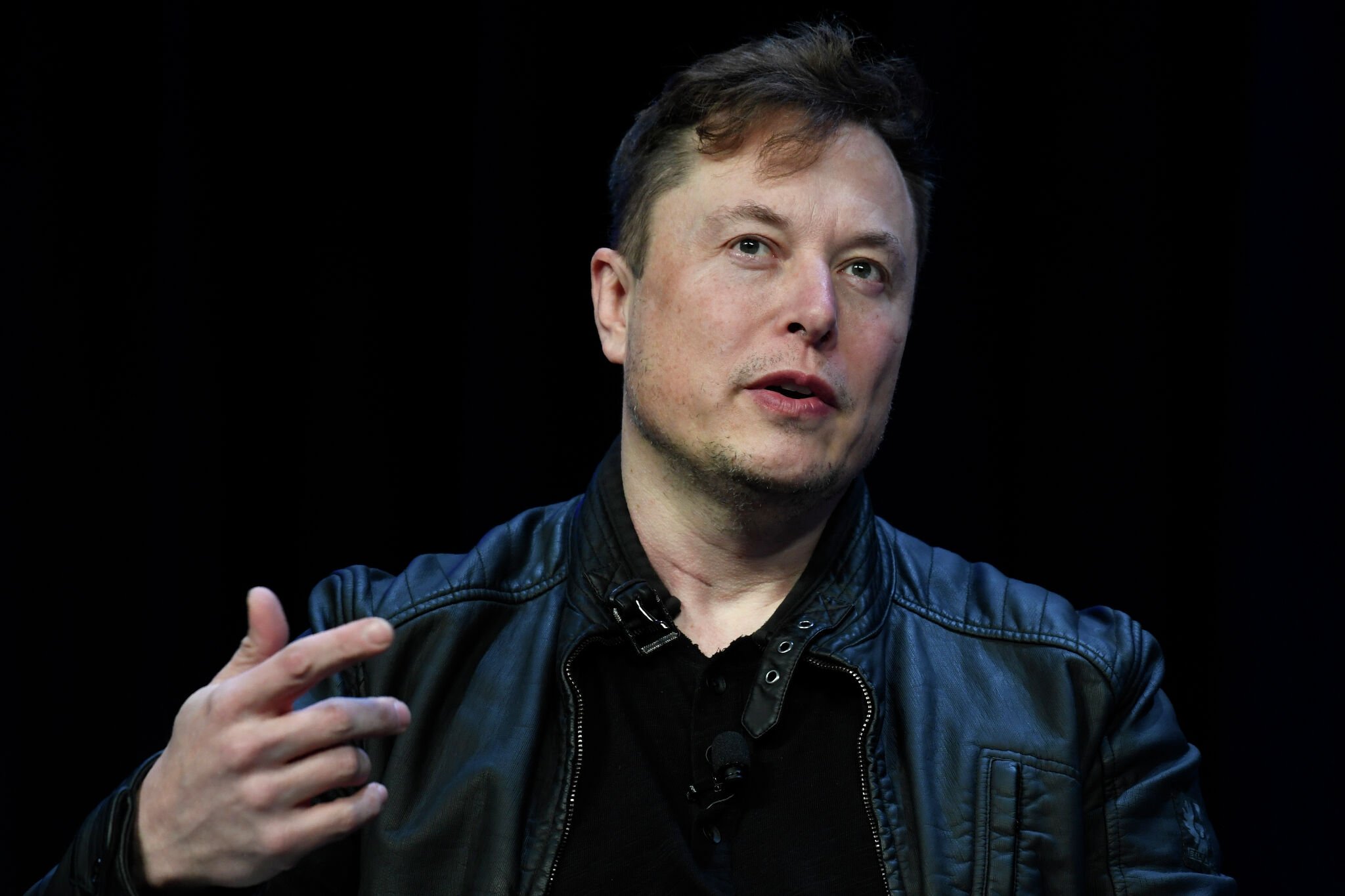 Elon Musk buys millions of Tesla shares in response to company's trillion dollar pay proposal