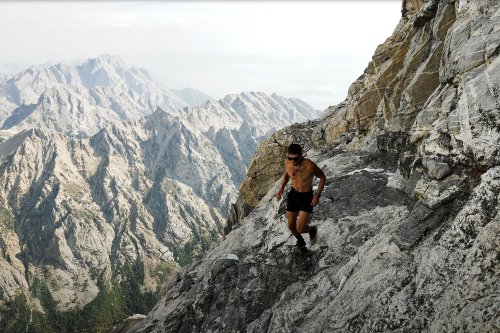 A record-breaking runner's national park shortcut may land him in jail