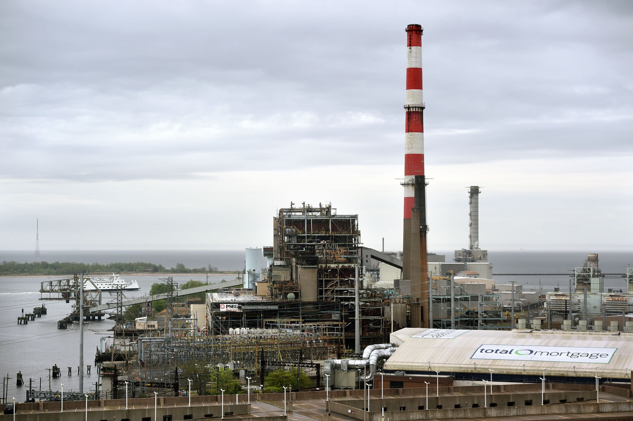 'Goodbye to the candy cane': Developer to tear down Bridgeport's iconic red-and-white smokestack