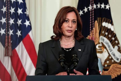 Why did Harris backtrack on saying Biden is running in 2024?