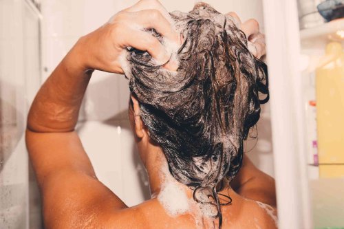 Should You Shampoo Your Hair Twice? Here's What Dermatologists Want You to Know