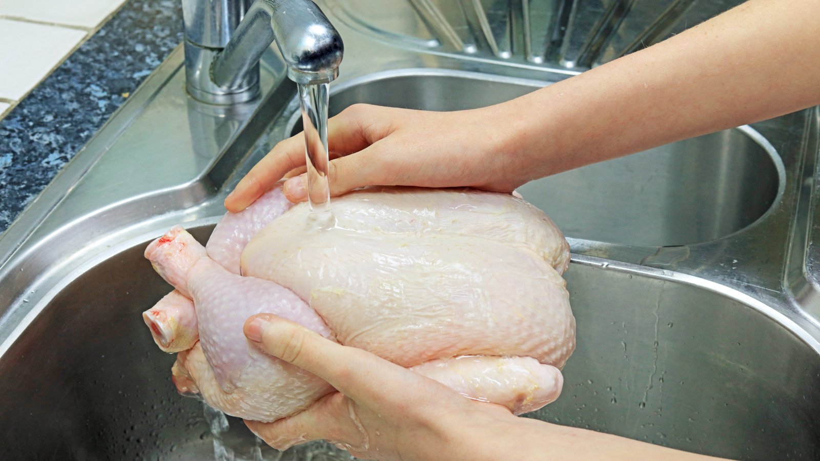 The Real Reason You Should Never Wash Raw Chicken - Health Digest