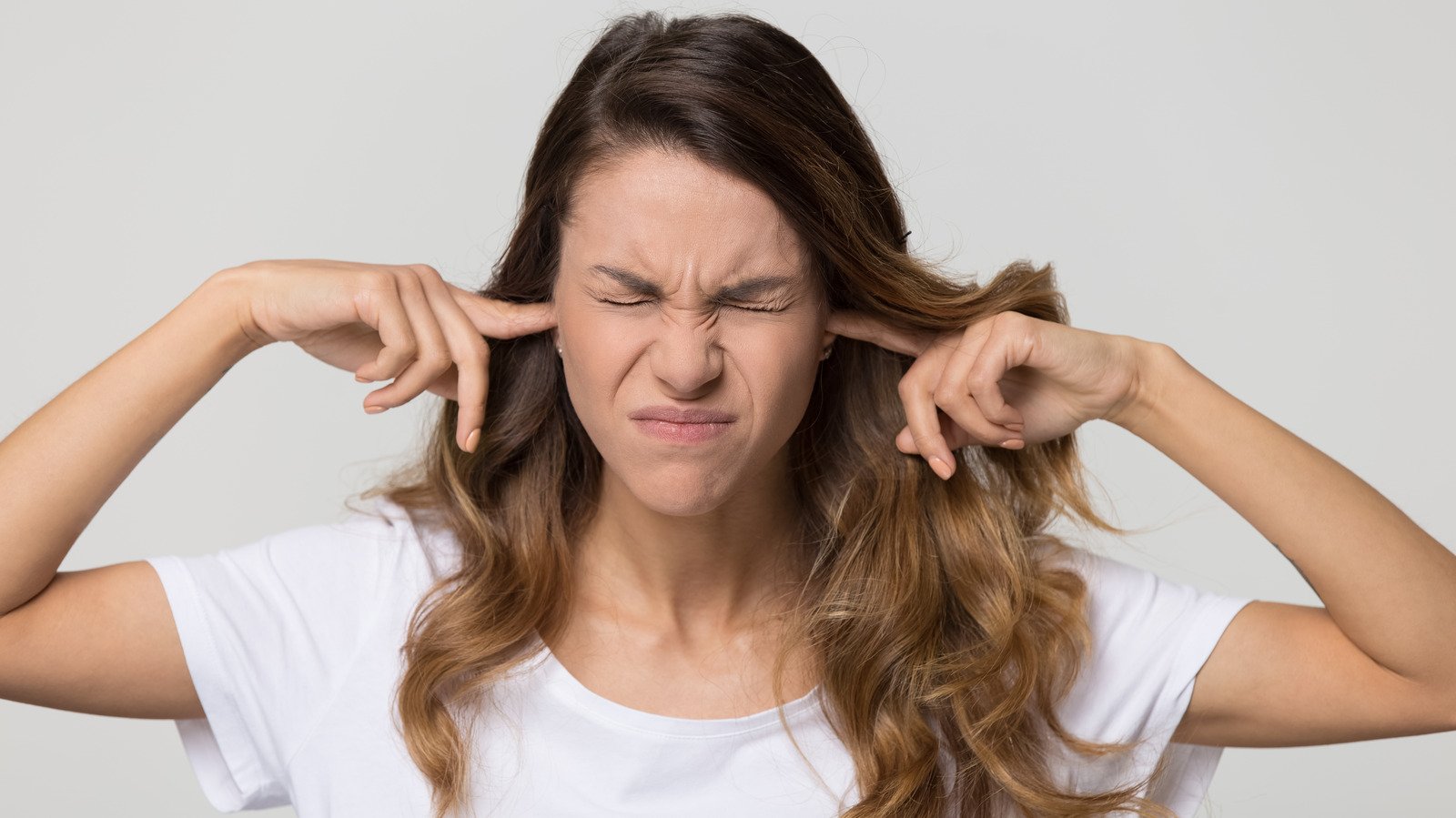 What Are Ringing Ears Really A Sign Of? - Health Digest