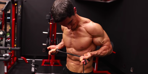 This Banded Curl Home Workout Blasts Your Biceps in 10 Minutes