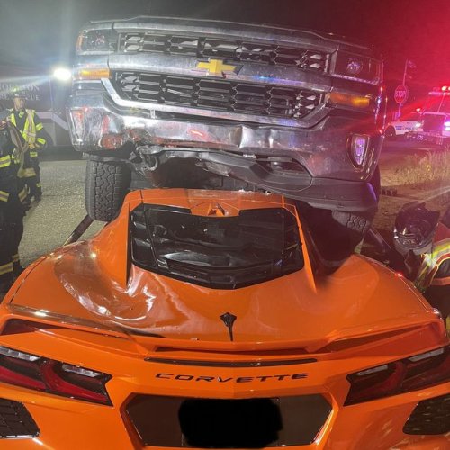 A Silverado fell on a C8 Corvette and the occupants walked away