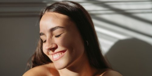 Lost A Lot Of Weight? Here's How To Tighten Your Skin Without Surgery, According To Dermatologists.