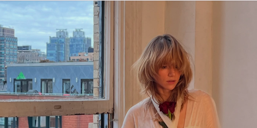 Suki Waterhouse Wears an All-White Sheer Dress with Tiny Undergarments