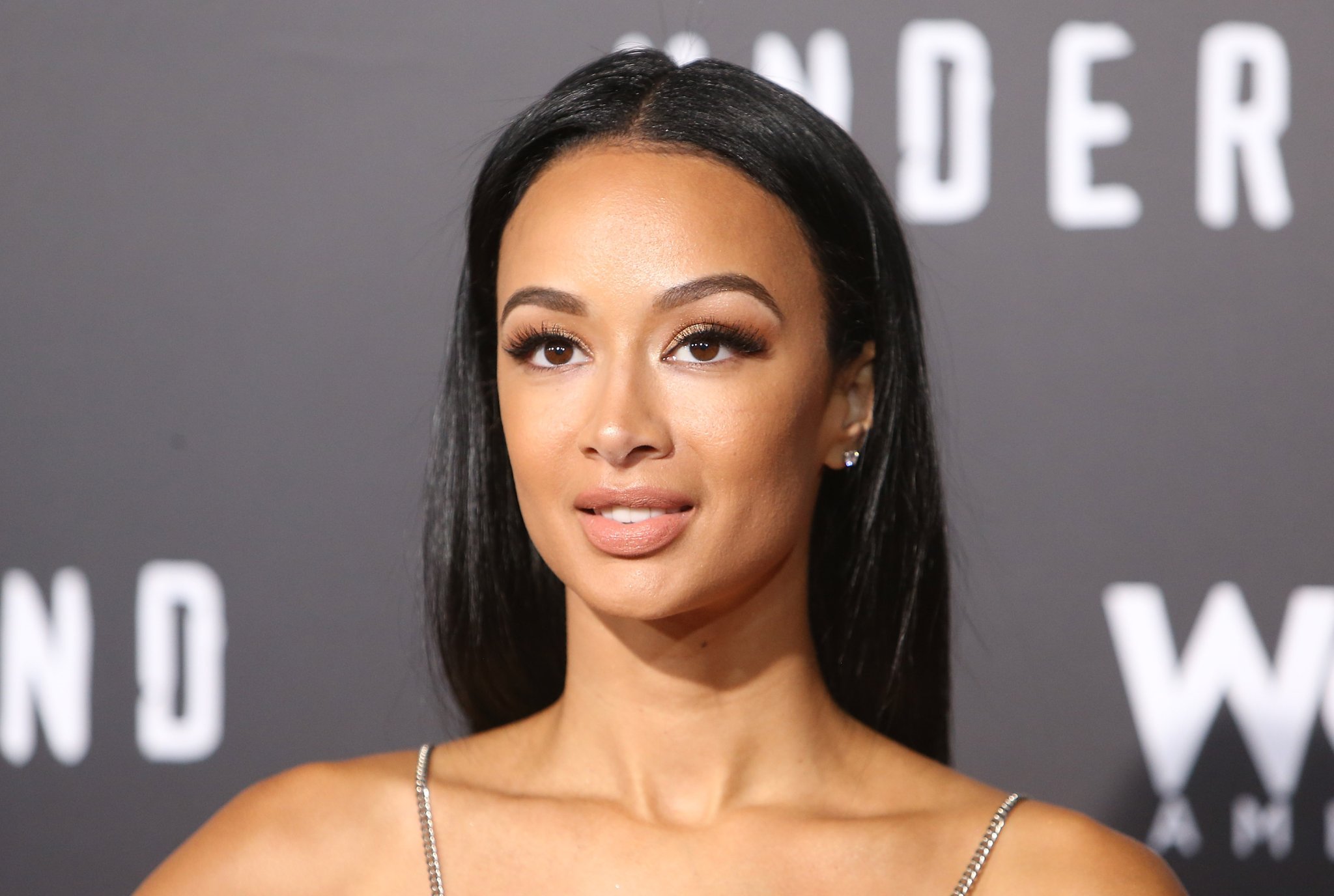 Draya Michele Sets The Internet Ablaze In A ‘Barely There’ Chain Skirt