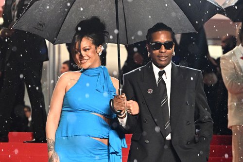 Rihanna & A$AP Rocky Posing In The Rain Is One Of The Most Iconic Moments We've Seen This Year