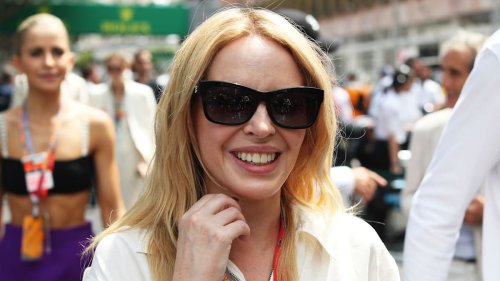 Kylie Minogue is a vixen in daring figure-hugging ensemble as she shares incredible news